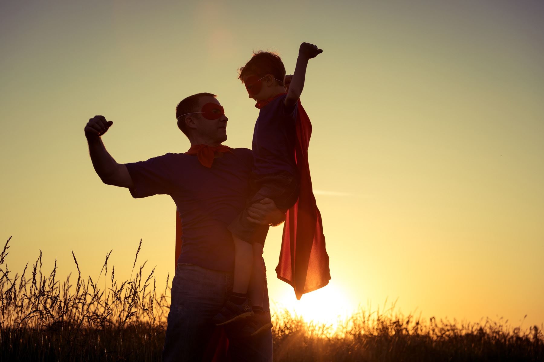 father-and-son-playing-superhero-at-the-sunset-pxt9g5v_1.jpg