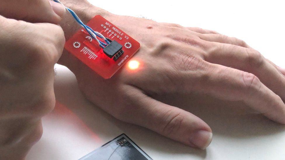 forget your cards & phones, this company builds microchip implants so that you can pay with your hands