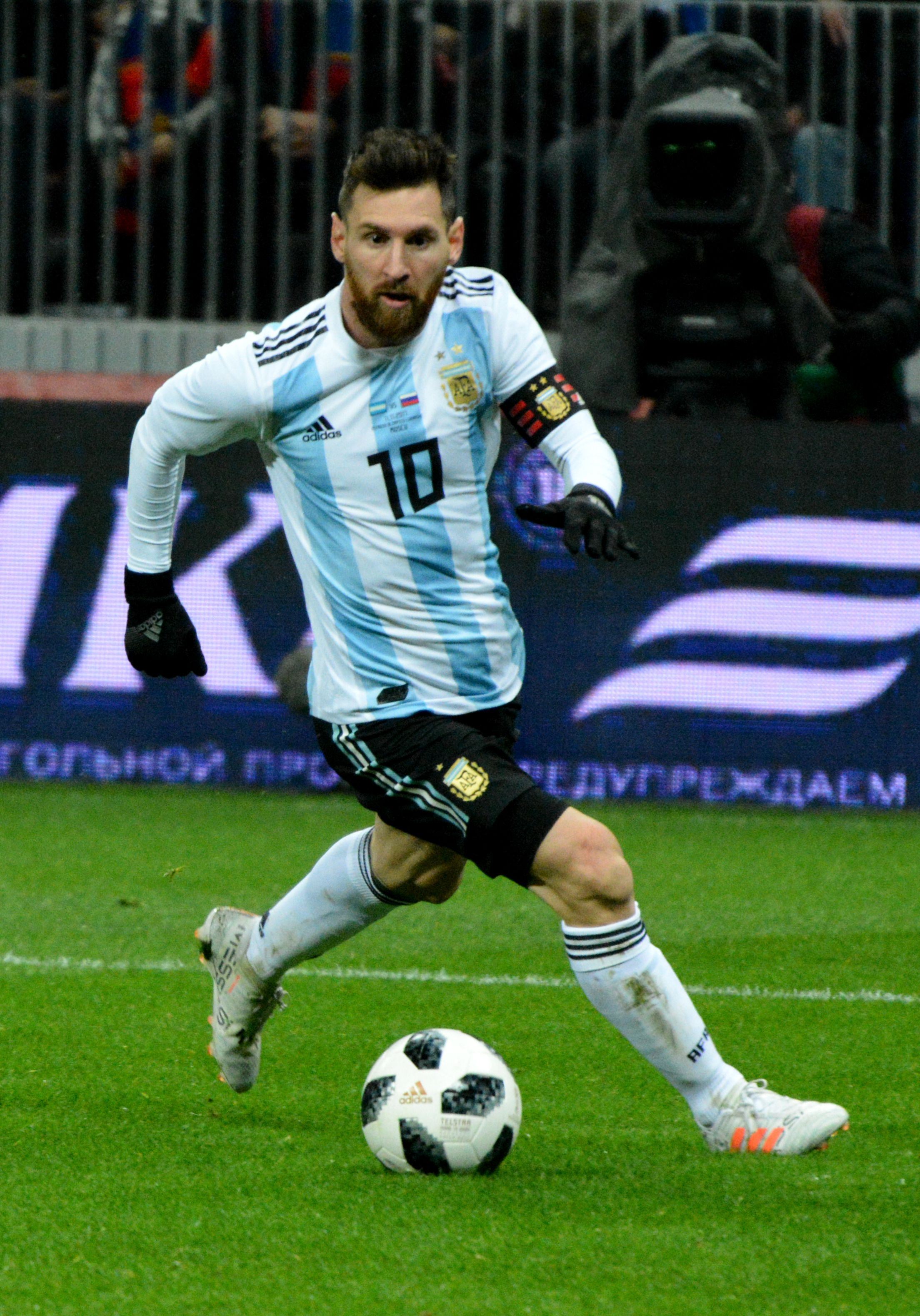 messi inspires argentina to victory in classic world cup final