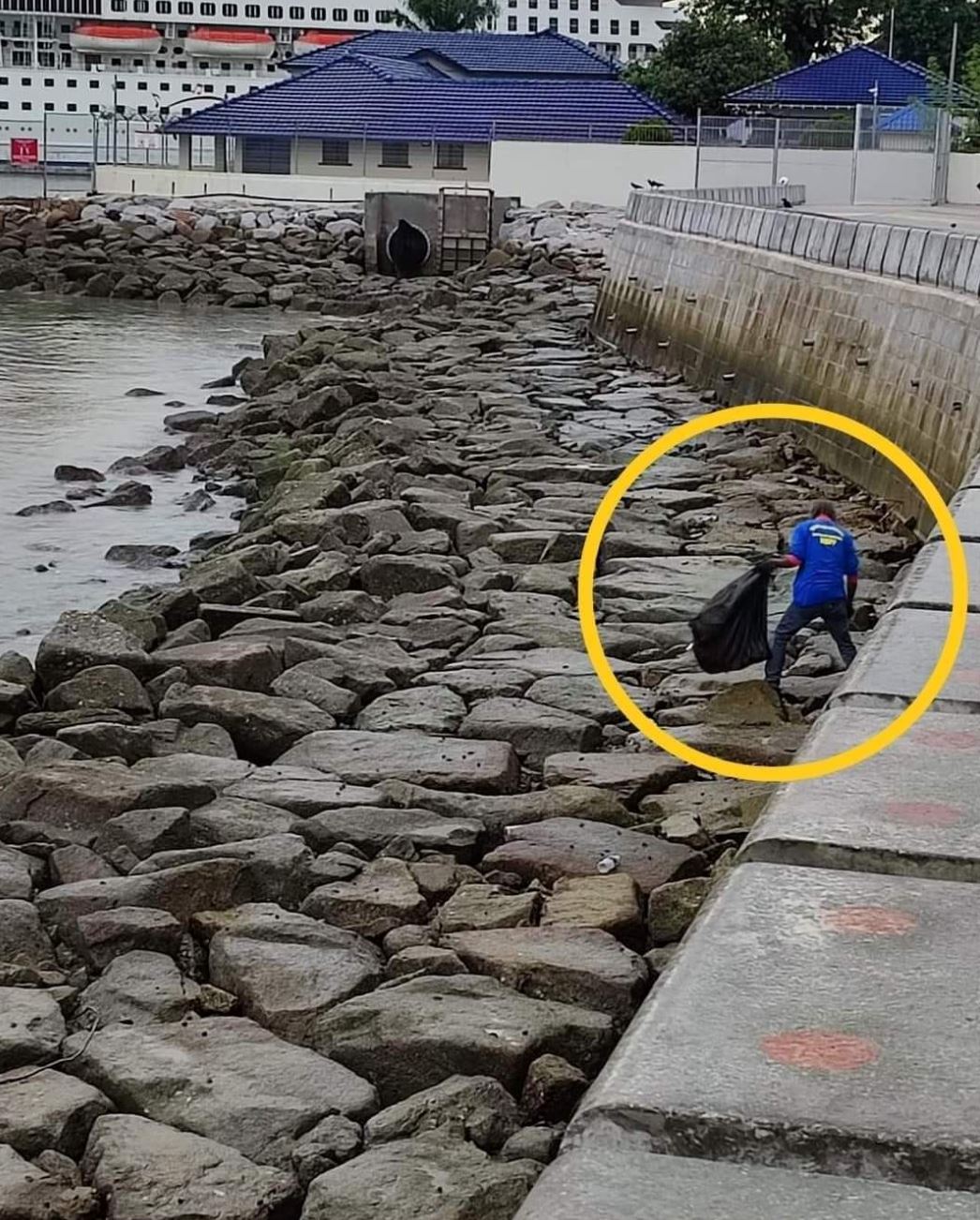 man in penang praised for cleaning up garbage-filled waterfront all by himself