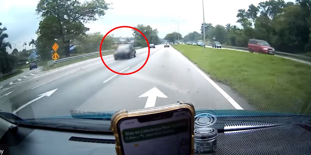 video of car caught on camera driving backwards on highway, sparks online debate