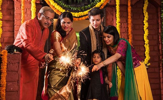 multiple-generation-indian-family-celebrate-deepavali.jpg