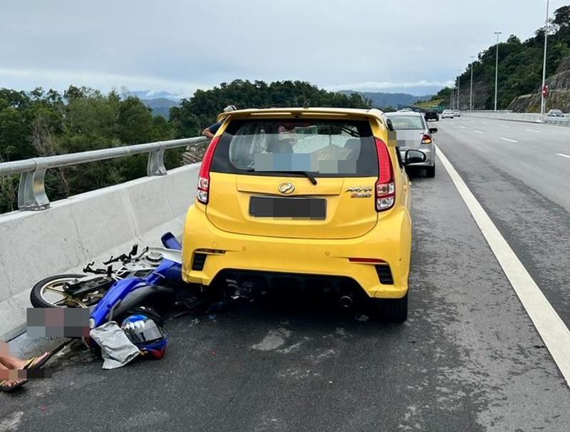 car stopping on emergency lane to take in kl view causes first accident on suke