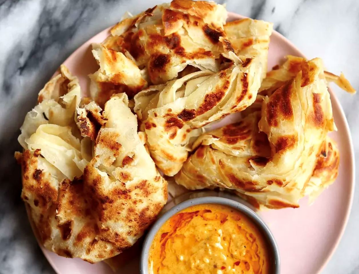 roti canai listed as the second best street food in the world by tasteatlas