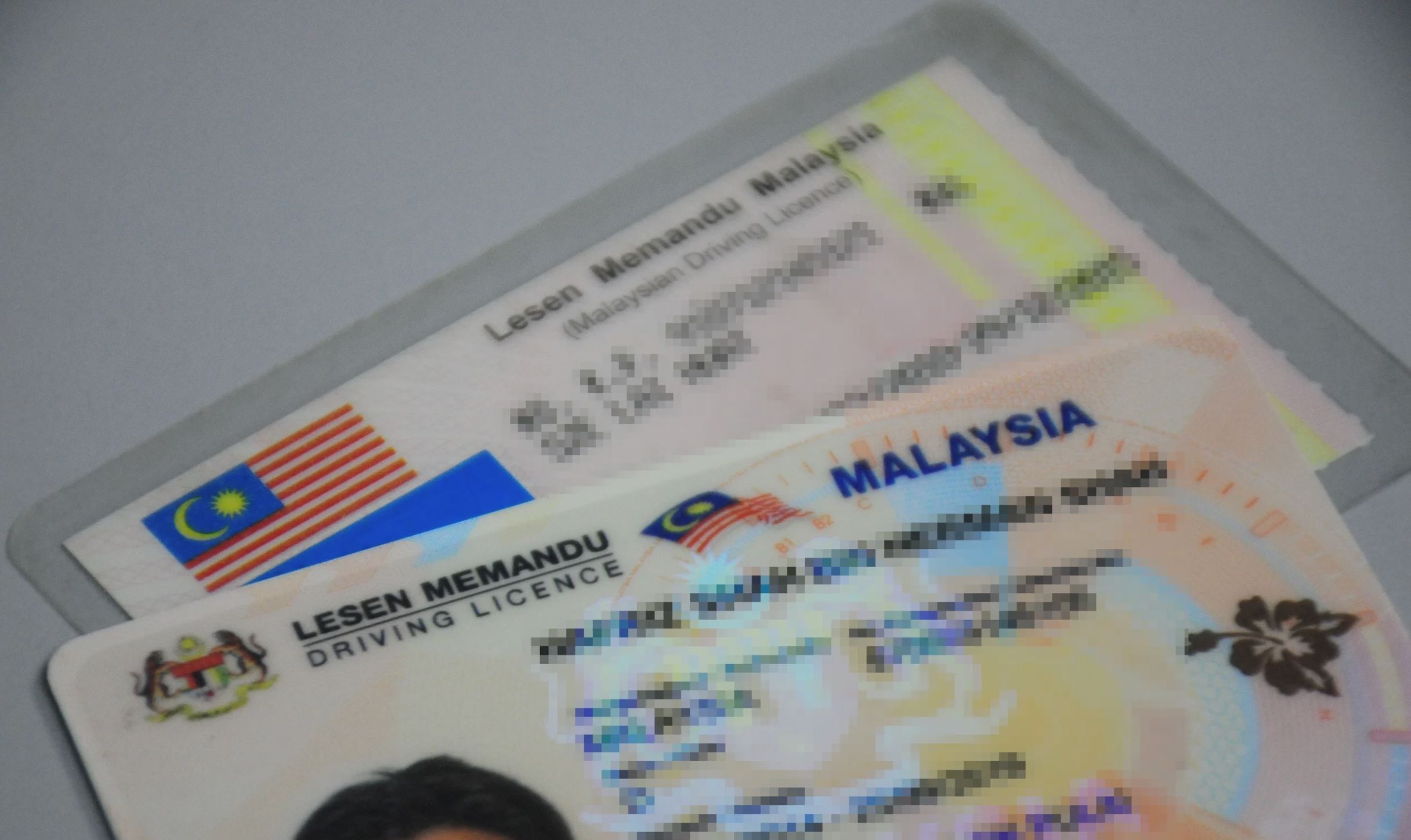 government is considering 10-year driving licence renewals, says transport minister anthony loke
