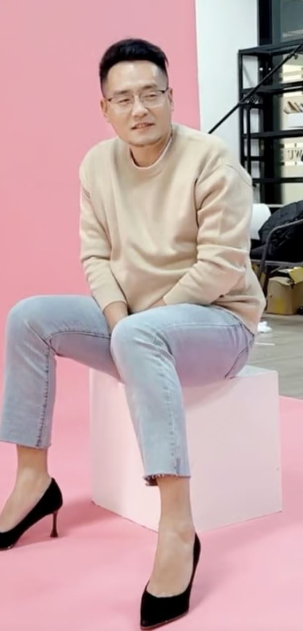 man in china made a fortune selling women’s high heels and modelling it himself!