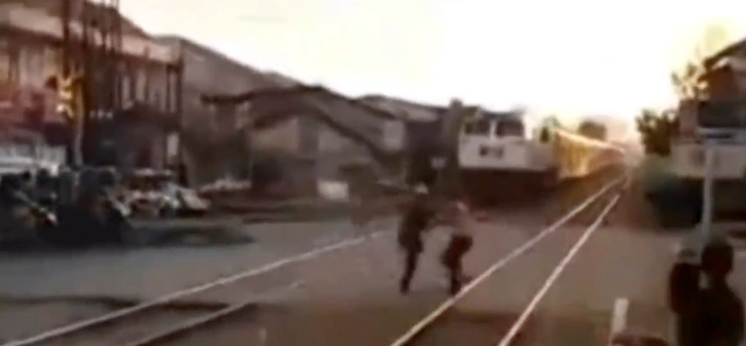 netizens praise heroic railroad worker who saves man from oncoming train in indonesia
