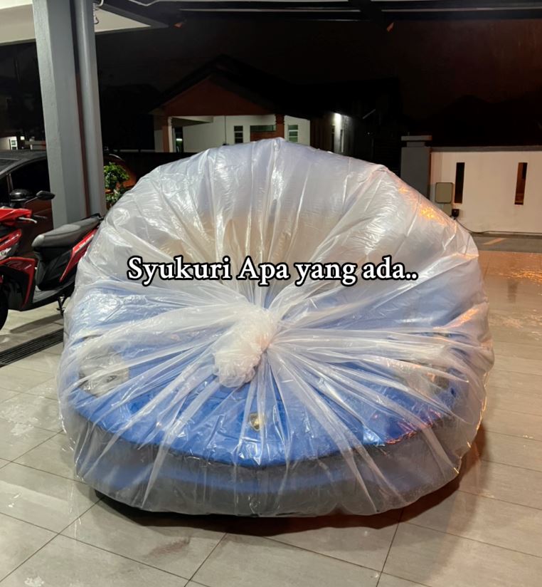 kagum lihat cara lelaki ini hadapi musim tengkujuh, “lambo ikat tepi satu!”