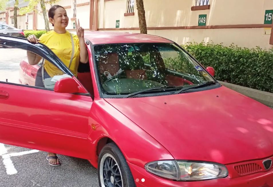 malaysian actress responds to critics of her older car with a witty retort: “buy me a car!”