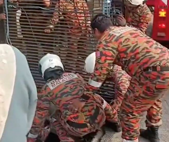 heroic abang bomba saves elderly homeless man trapped in 2-meter deep drain