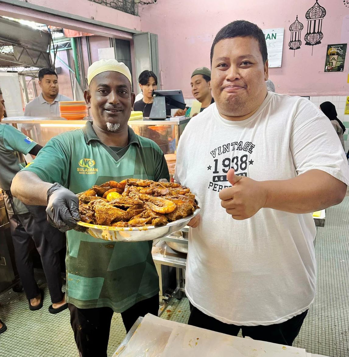 record shattered! malaysian spends rm400 on massive nasi kandar feast and finishes it himself