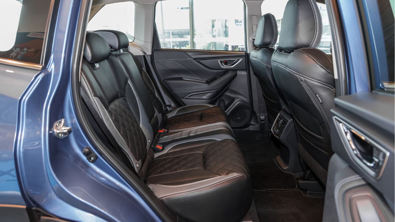 The spacious interior of a Subaru Forester's backseat area
