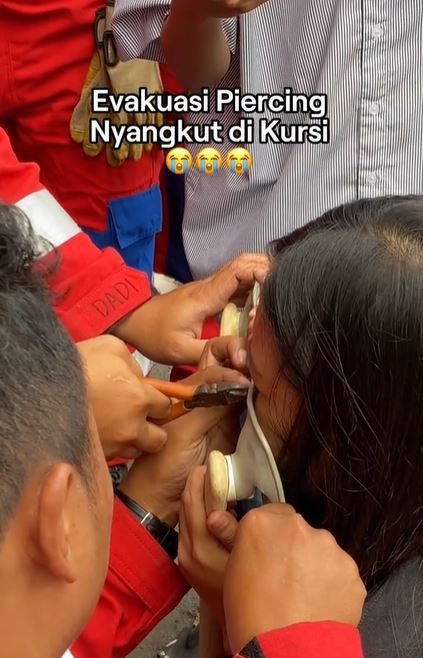 firefighters save the day (and a nose piercing) in unusual rescue mission