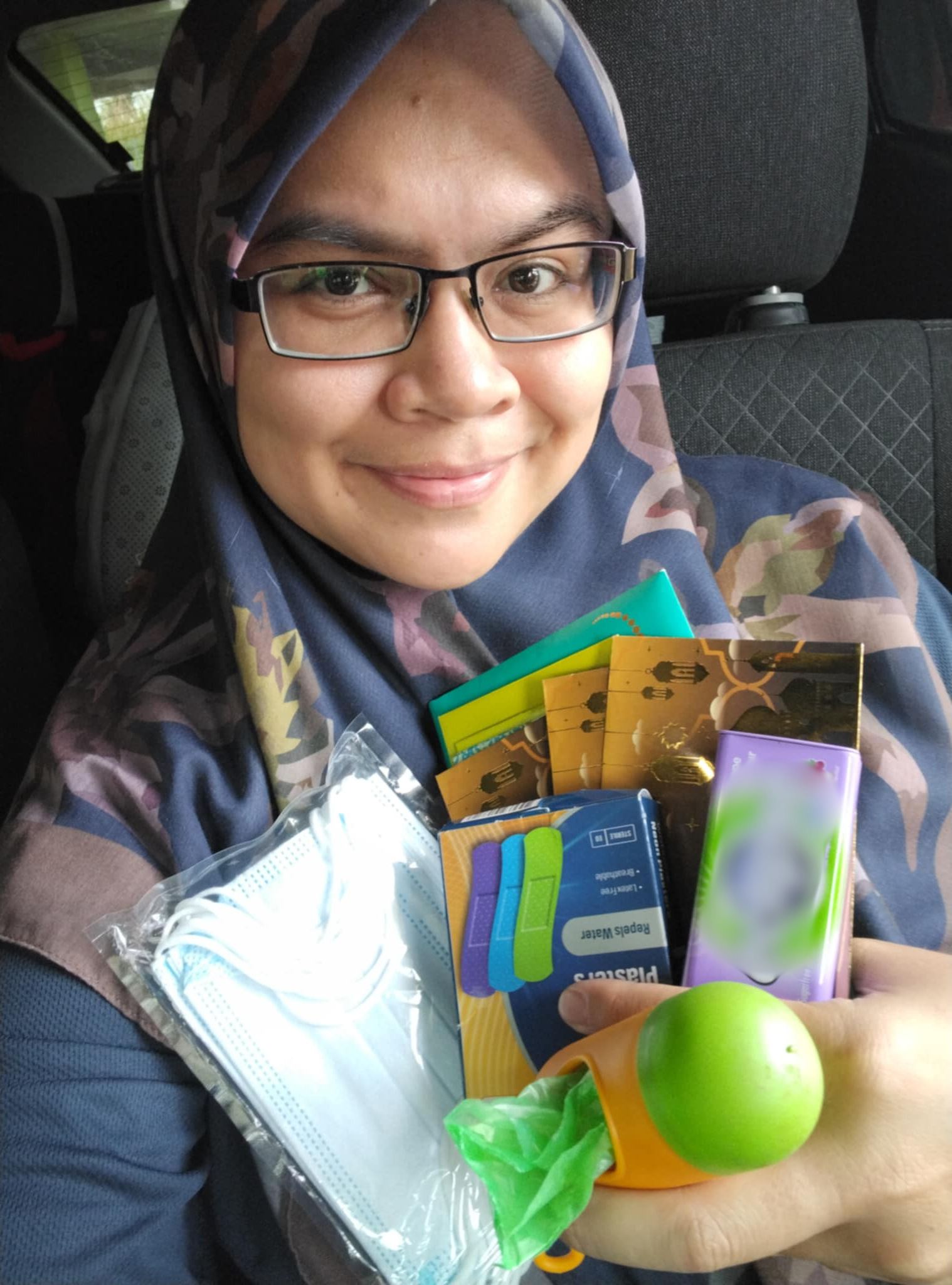 woman and items in her car