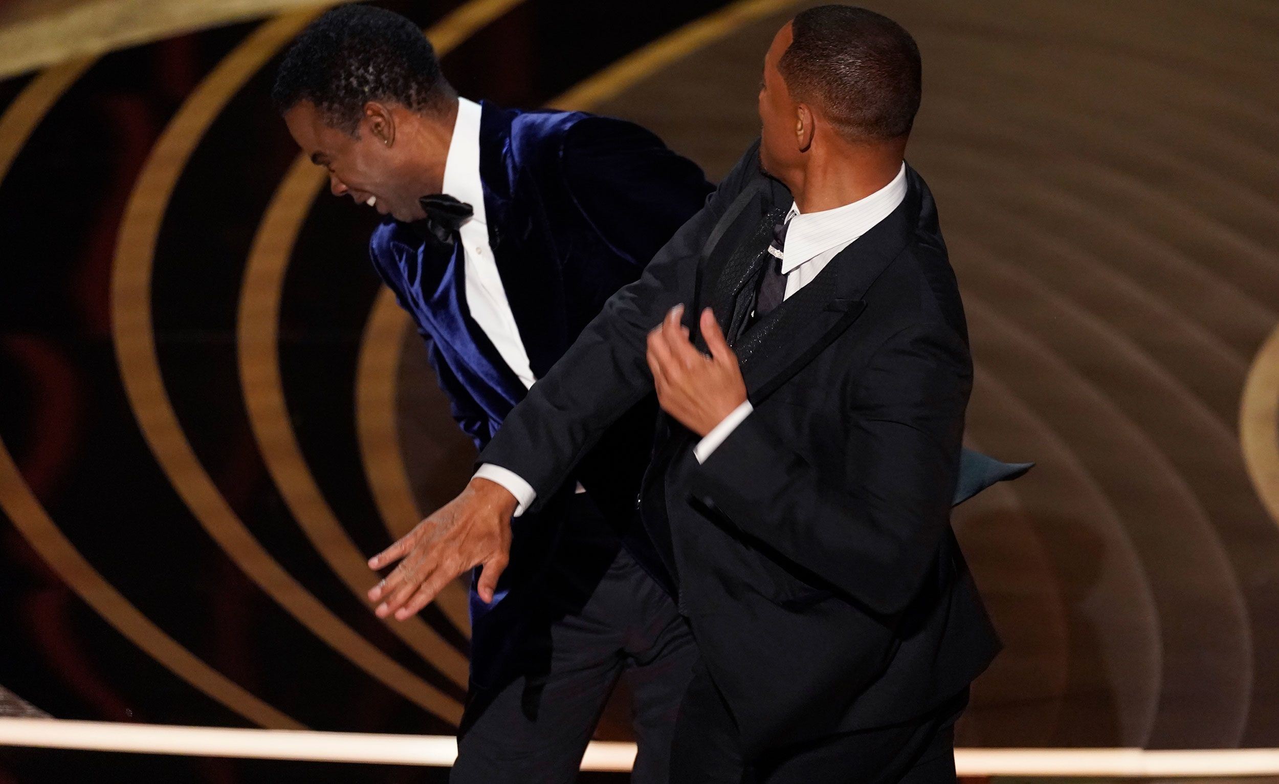 chris rock makes oscars after-party comeback, teases potential hosting return