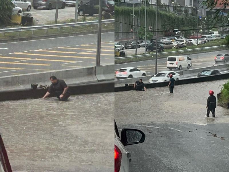 selfless motorcyclist clears drain in pouring rain to prevent flooded roads
