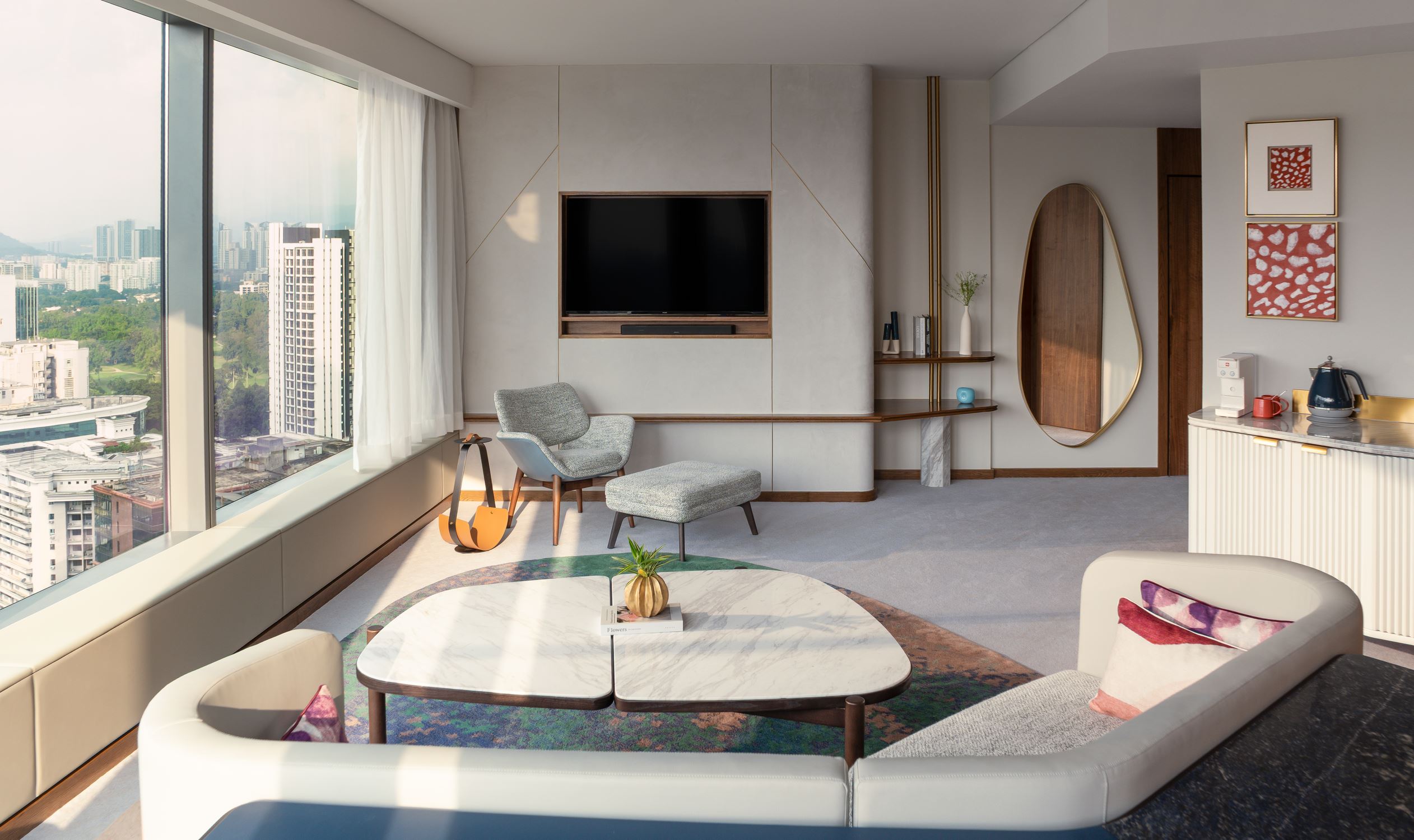 Living room of a suite in Kimpton Naluria Kuala Lumpur hotel in TRX